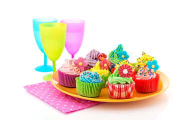 Colorful cupcakes with lemonade