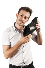 Fototapeta na wymiar Man showing one shoe