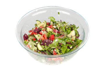 vegetable salad in a large glass bowl