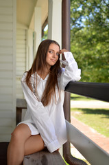 Obraz premium Russian girl sitting on the bench