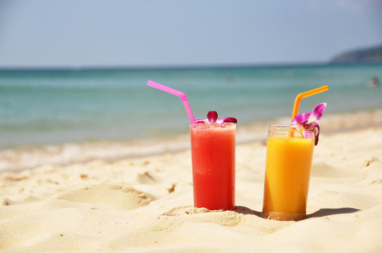 Pair of fruit shakes on the tropical beach