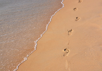 Footmarks on the sandy beach