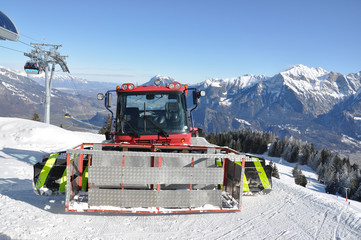 Snowplow in Pizol, famous Swiss skiing resort ..