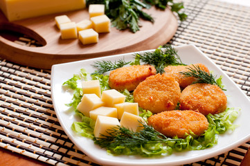 Chicken nuggets with  cheese
