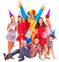 Fototapeta premium Birthday party group of teen with clown.