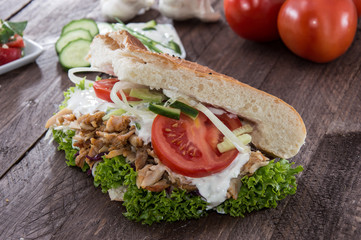Pita bread with Kebab on wood