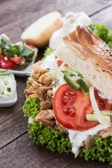 Pita bread with Kebab on wood