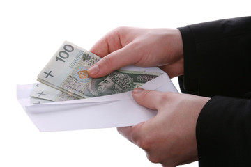 Businessman giving money in envelope - obrazy, fototapety, plakaty