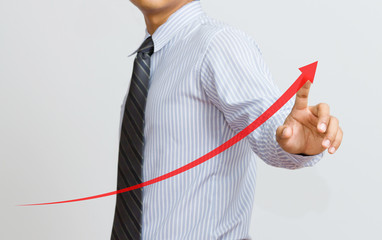 a Business hand pressing a growth chart