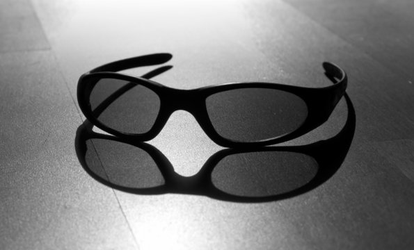 Monochrome photo of black modern sun glasses