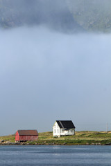 white house, red cabin   and fog