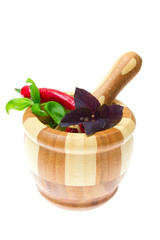 Herb leaves of parsley, bay leaves and  pepper in mortar