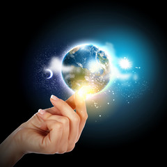 hand touching the earth