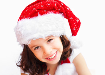 Child wearing santa claus christmas hat