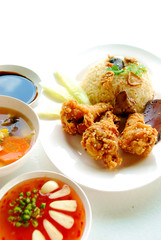 Rice steamed with chicken soup and Fried Chicken wings