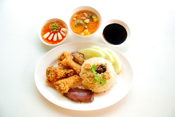 Rice steamed with chicken soup and Fried Chicken wings