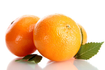 ripe tangerines with leaves isolated on white