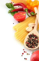 Pasta spaghetti, vegetables and spices, isolated on white