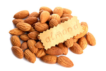 tasty almonds nuts, isolated on white