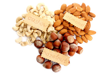 assortment of tasty nuts, isolated on white