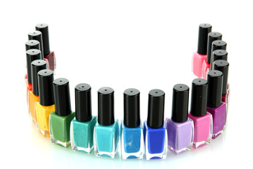 Group of bright nail polishes isolated on white