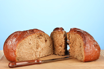 sliced bread on blue background close-up
