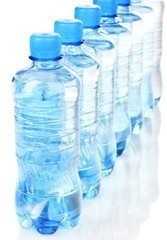 plastic bottles of water isolated on white