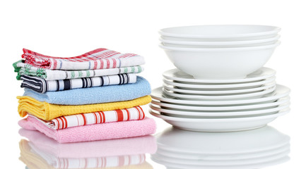 Kitchen towels with dishes isolated on white background