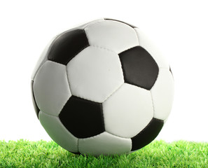 Fototapeta na wymiar football ball on green grass, isolated on white