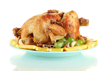 whole roasted chicken with grapes, oranges and spices