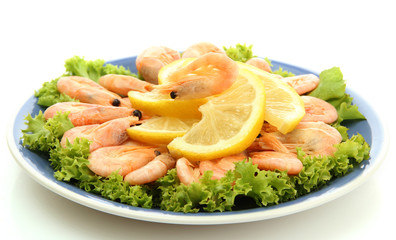 Boiled shrimps with lemon and lettuce leaves