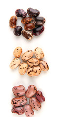Three hill of beans isolated on white