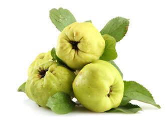 sweet quinces with leaves, isolated on white