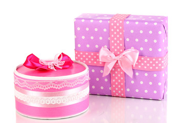 Colorful pink and purple gifts isolated on white