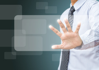 business hand pushing on a touch screen interface