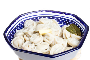 Bowl with traditional russian dish - pelmeni
