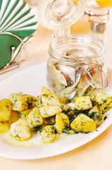 Boiled potatoes with salted herring