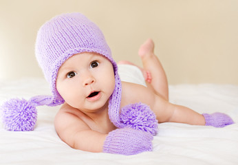 babe in gloves and hat © mariiya
