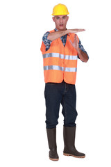 Man making time-out gesture