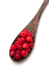 cranberries in a wooden spoon
