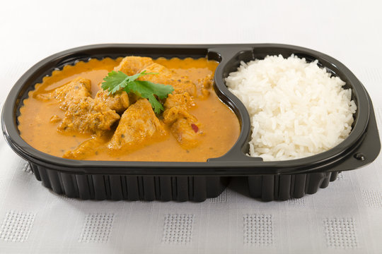 Takeaway curry - Chicken curry and rice in a plastic container