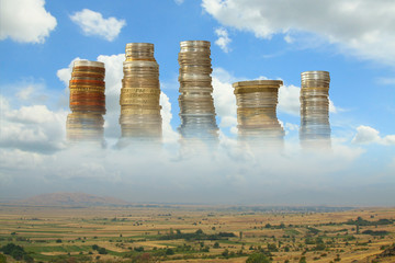 Stakes of Coins over a Dry Landscape - obrazy, fototapety, plakaty