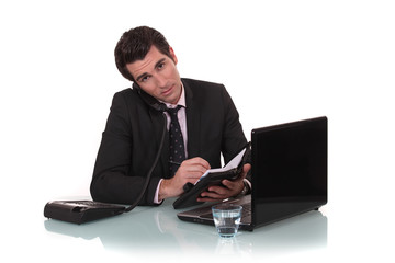 A businessman taking an appointment.