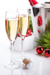 Champagne glasses and christmas decor