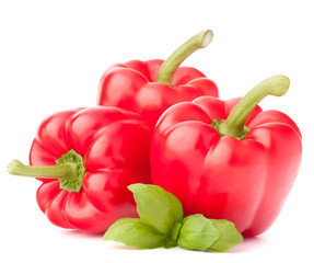 Sweet red pepper and basil leaves still life