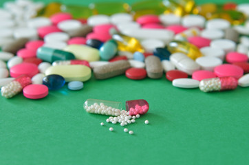 Drug on green background