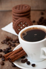 cup of coffee and chocolate cookies 