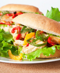 Grilled chicken sandwich with paprika and lettuce 
