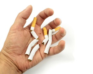 Crushing cigarettes in hand