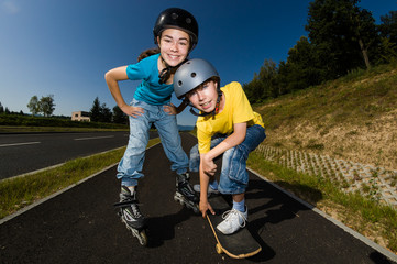 Active young people - rollerblading, skateboarding © Jacek Chabraszewski